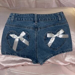 Edikted Denim Shorts with Heart Pockets and White Bows